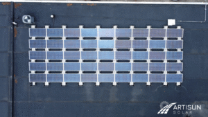 Drone-captured image showing the Keusch Glass building’s solar panel system integrated into the rooftop, promoting clean energy production in the manufacturing and glass industry sector