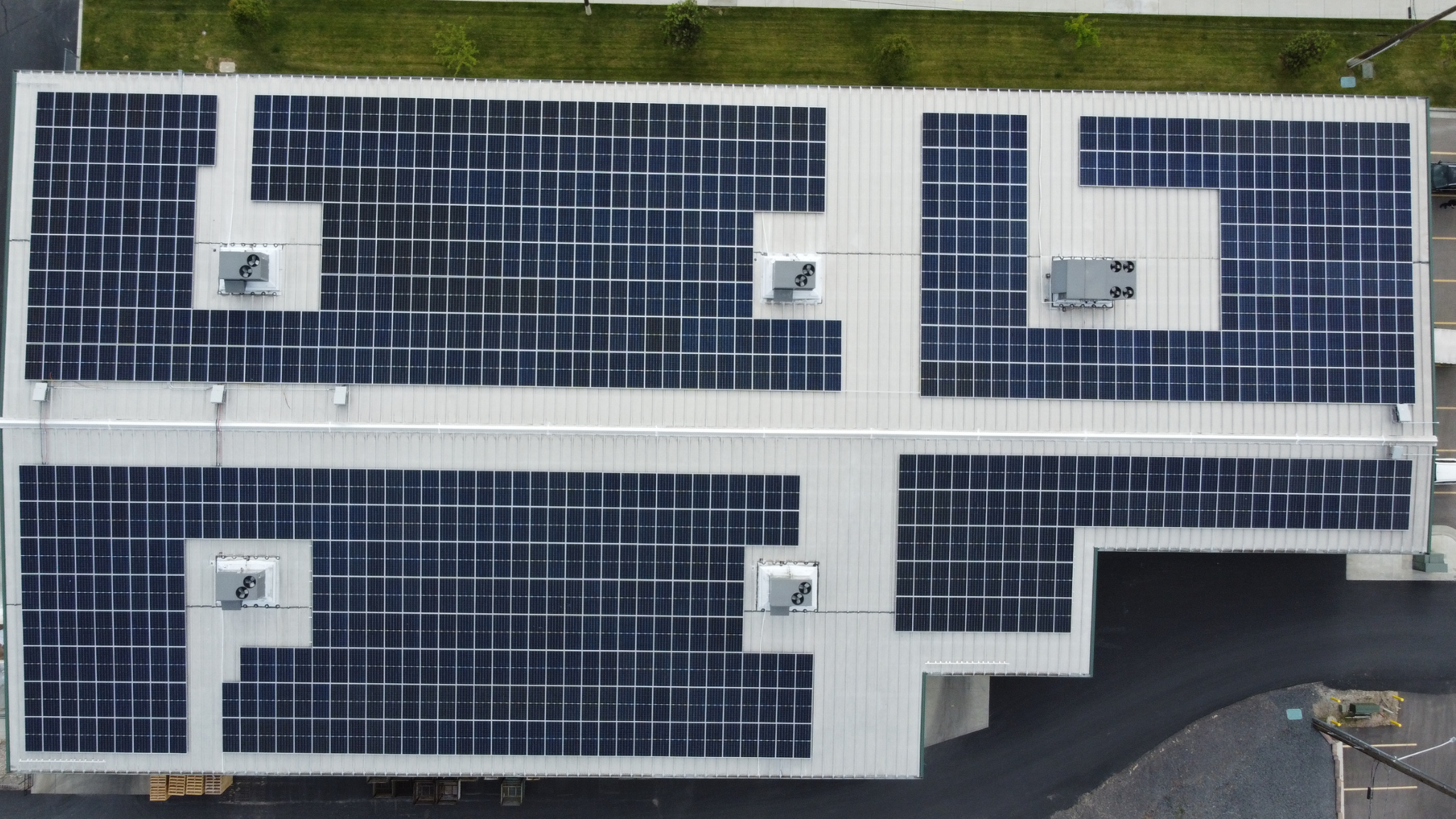 Commercial rooftop solar panel installation by Artisun Solar
