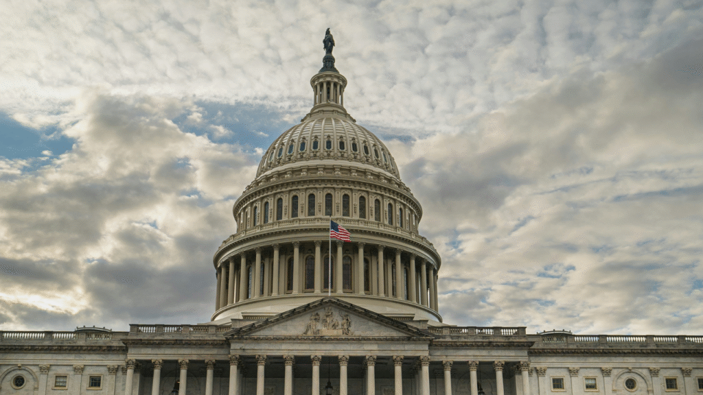 U.S. Capitol Building in Washington D.C. with American flag, symbolizing federal solar tax credit legislation and clean energy policy