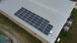 Industrial rooftop solar panels by Artisun Solar providing 100 percent energy offset for Trahan Construction.
