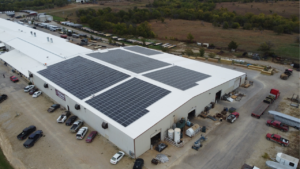 Titan Trailer manufacturing facility in Waterville KS with commercial rooftop solar panels installed by Artisun Sola