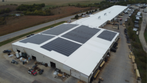 Artisun Solar commercial rooftop installation at Titan Trailer Waterville Kansas aerial view