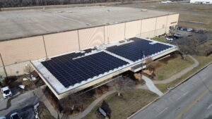 Aerial view of the rooftop solar array installed at Preston Refrigeration, projected to save $813,357 in lifetime electricity costs.