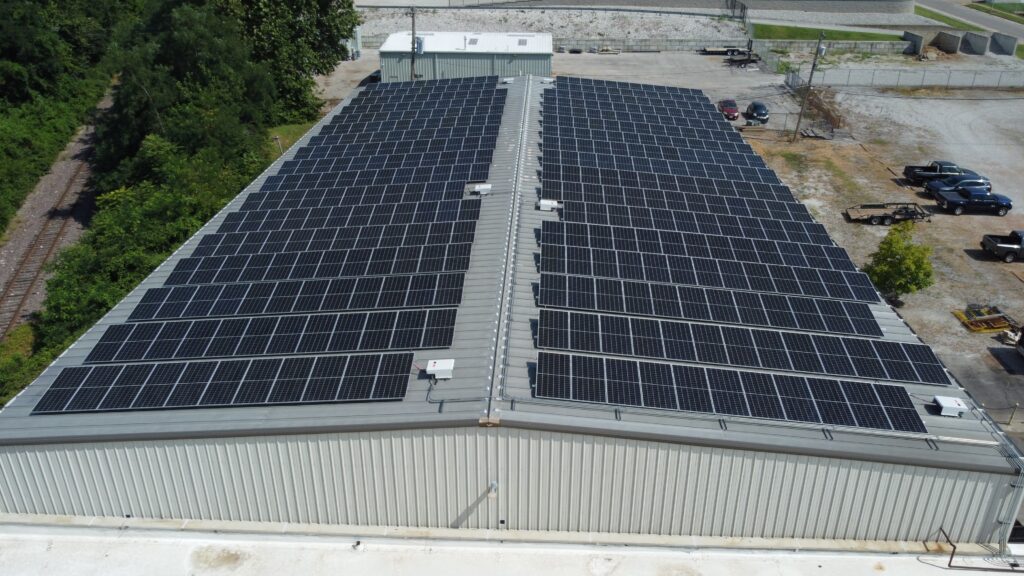 Wide aerial view of the rooftop solar array at Car-Anth Manufacturing, which is expected to save the company $23,412 in the first year.
