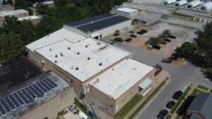 Close-up view of the solar panels installed on the angled metal rooftop.