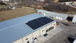 Rooftop solar panels on the Busenbark Granite building projected to save $505,668 over its lifetime in Farmington, MO.