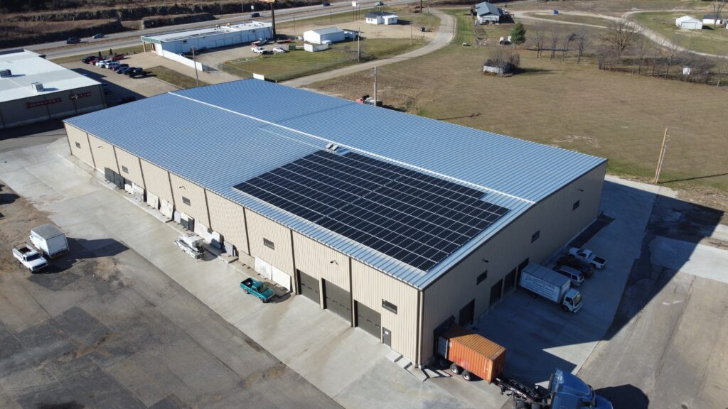 Aerial view of the Busenbark Granite rooftop solar array delivering 82.71% energy offset through Ameren in Farmington, MO.