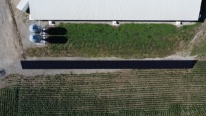 Top-down aerial view of Judson Vos ground-mount solar array projected to save $199,460 over its lifetime.