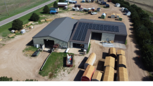 Rooftop solar panel array installed by Artisun Solar on a Greensburg Mini Barns building in Greensburg, Kansas.