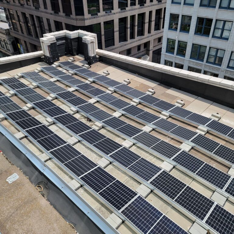 Rooftop solar installation at Andrews McMeel Universal, Kansas City, delivering $8,932 in projected annual savings.