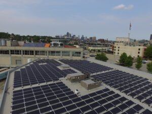 Artisun Solar crew installing commercial rooftop solar panels at Boulevard Brewing Company, Kansas City, MO, served by Evergy