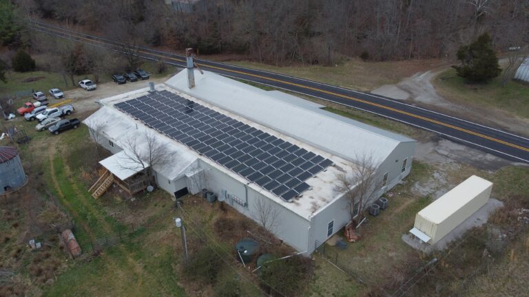 Aerial view of ASSEMBLAGE facility and commercial solar array in Arkansas
