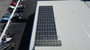 Rooftop solar array at Dri-Port Marine in O'Fallon, MO, set to offset 972.7 metric tons of CO₂.