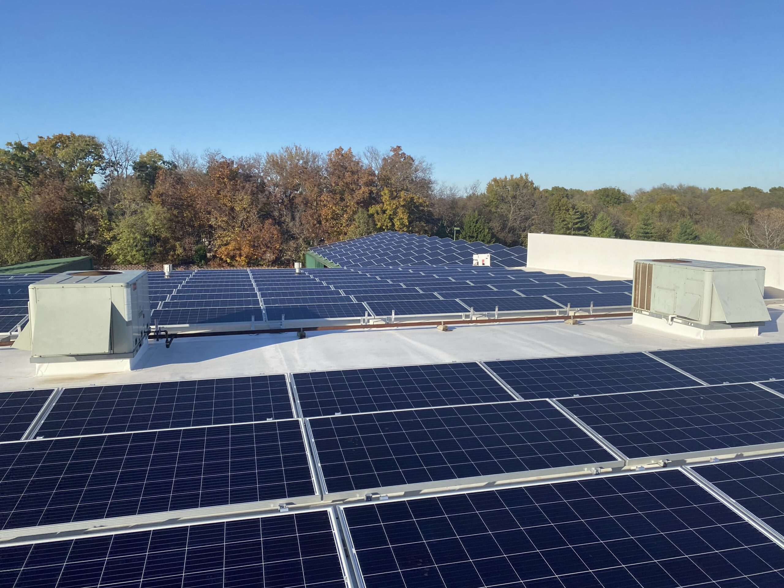 Aerial view of Guier Fence Co. commercial solar system producing 64.35 kW (AC) in Blue Springs, MO