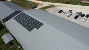 Overhead view of PAI INC's Winona rooftop solar array producing 120 kW (AC).